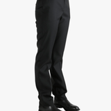 Grey pant worn by a person, showing the pant's fit