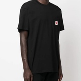 Black t-shirt worn by a person, showing the shirt's fit