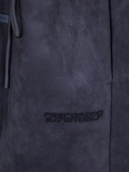 Close up of black short, showing texture of the Polyester fabric