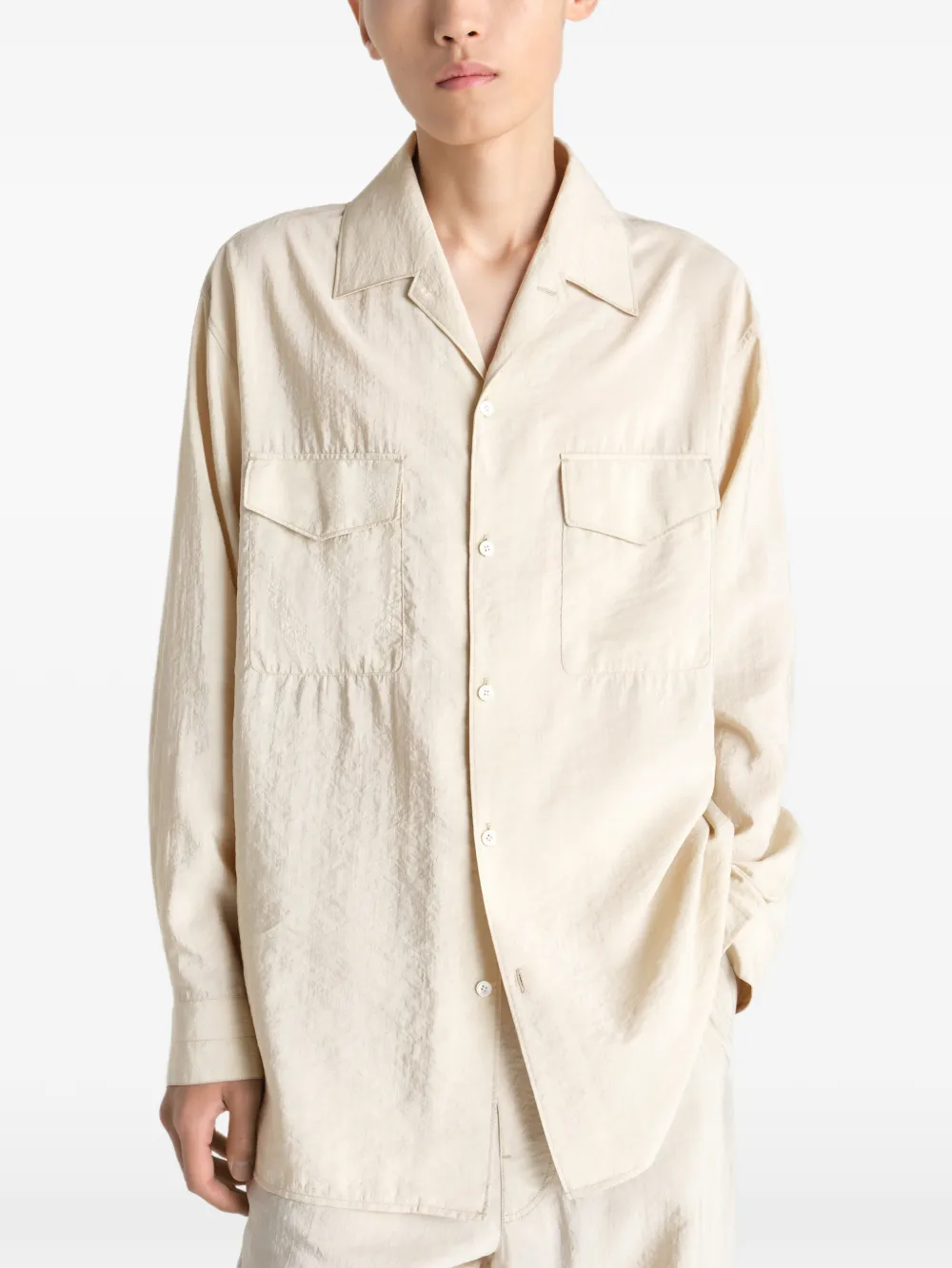 White shirts worn by a person, showing the shirts fit