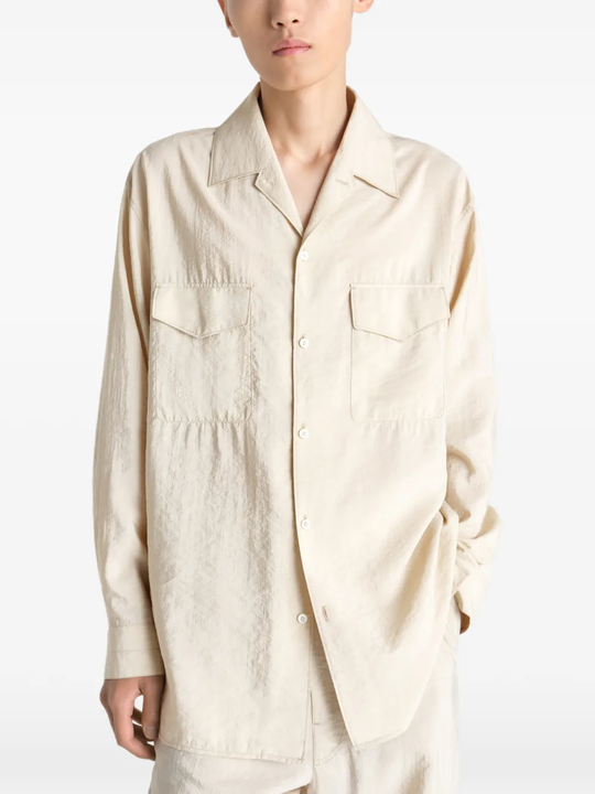 White shirts worn by a person, showing the shirts fit