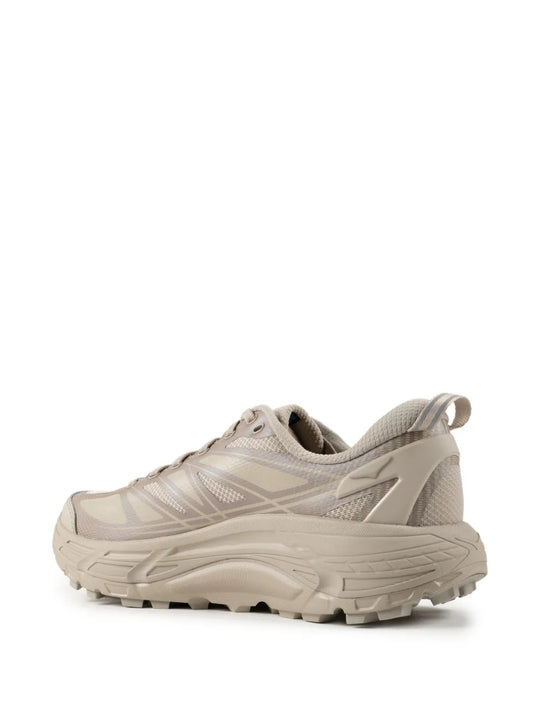 Tan shoes, side view