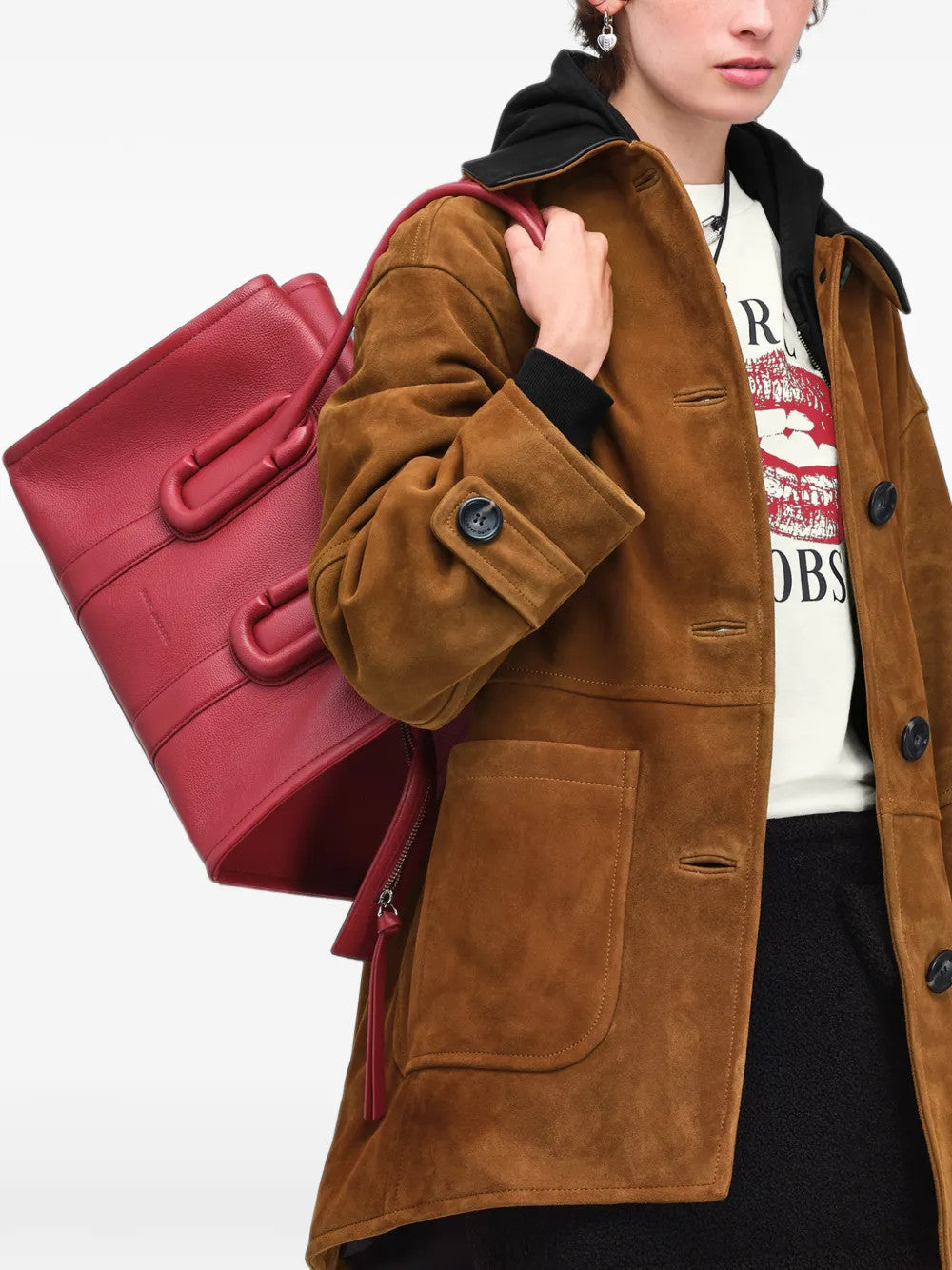 Red bag worn by a person, showing the bag fit