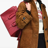 Red bag worn by a person, showing the bag fit