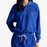 Blue top worn by a person, showing the top's fit