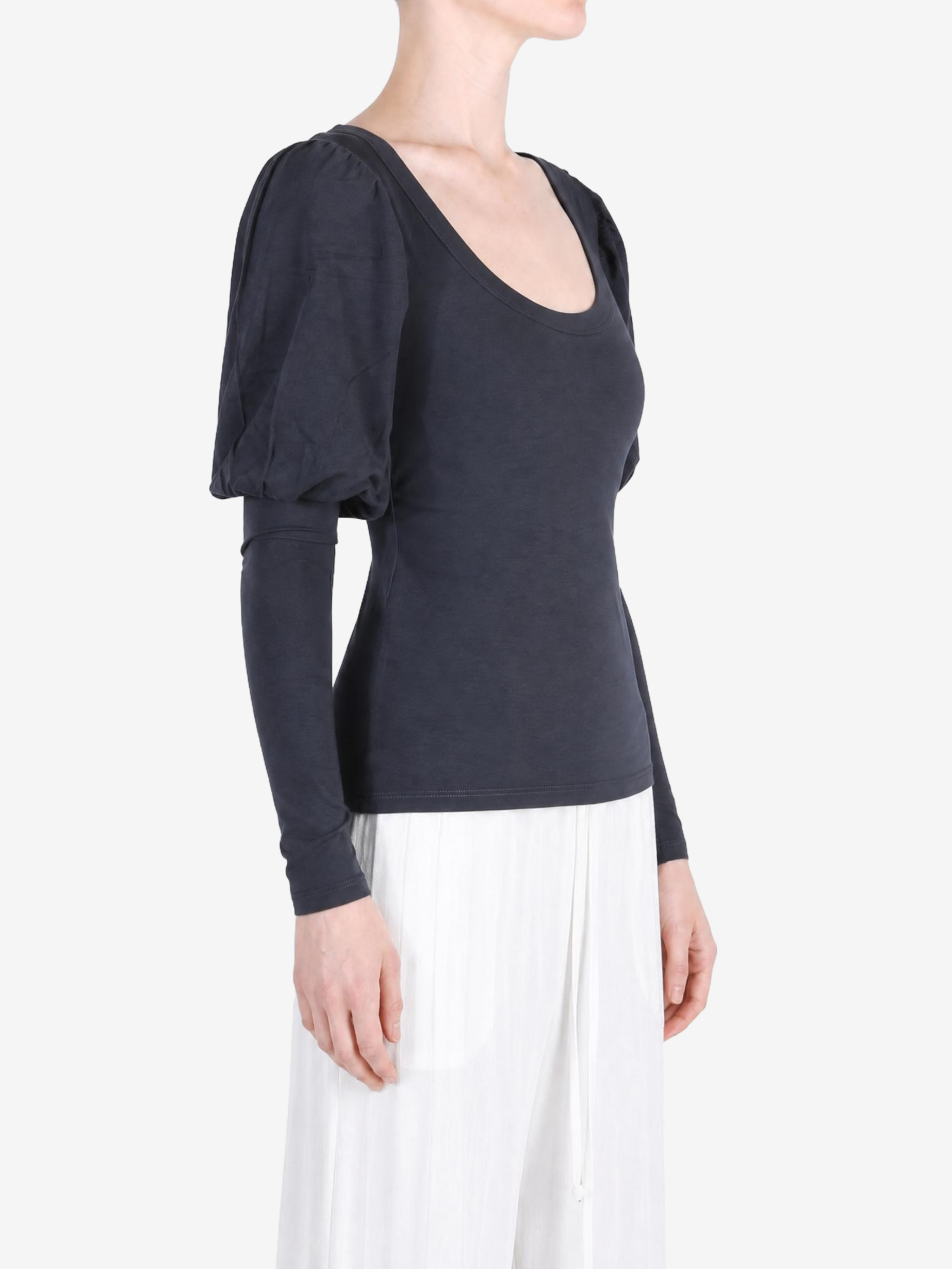 Navy top worn by a person, showing the top fit