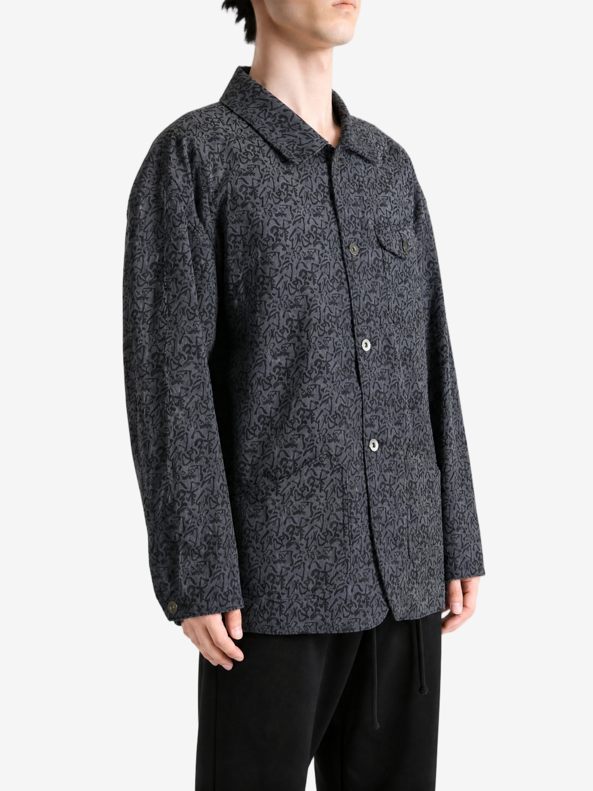 Grey jacket worn by a person, showing the jacket fit