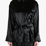 Black top worn by a person, showing the top's fit