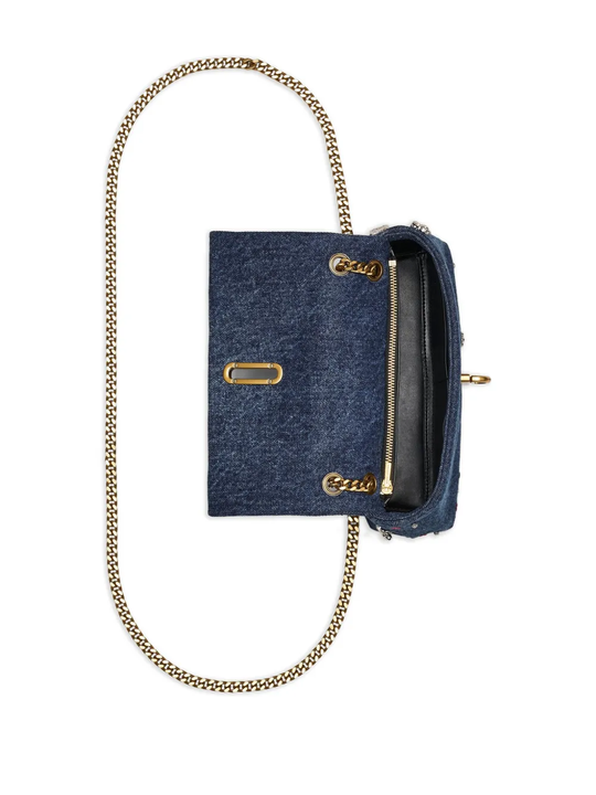 Close up of blue bags, showing texture of the polyester and cotton fabric
