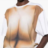 White t-shirt worn by a person, showing the t-shirt fit