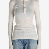 White T-shirt worn by a person, showing the shirt's fit