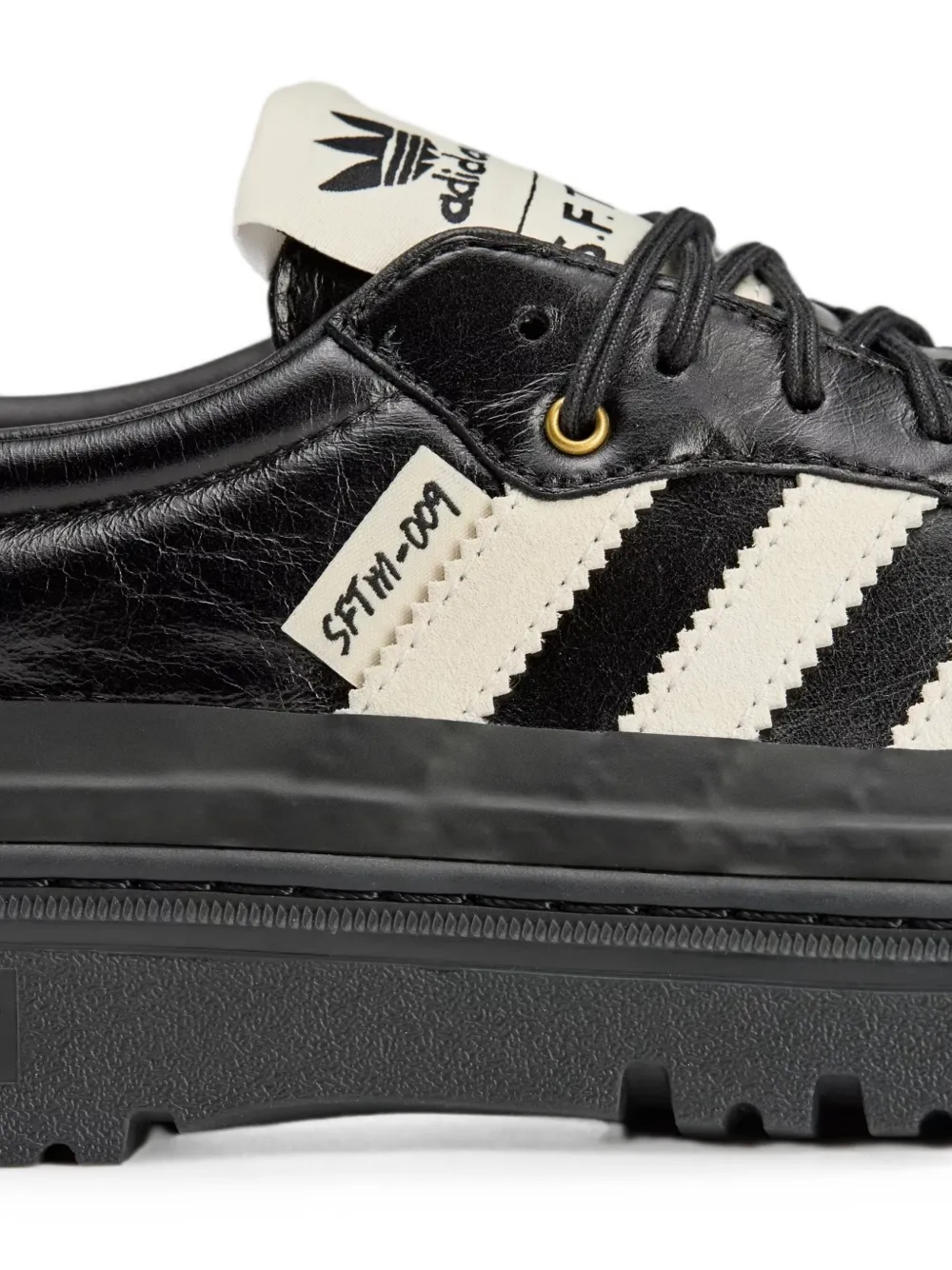 Close up of Black sneakers, showing texture of the Calf Leather fabric
