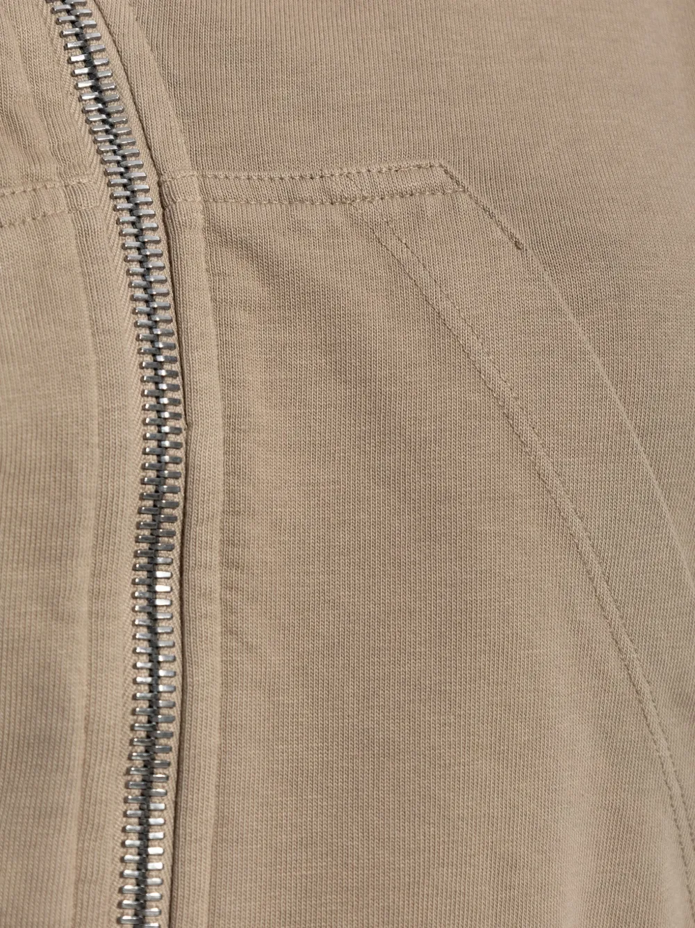 Close up of brown hoodies, showing texture of the cotton fabric