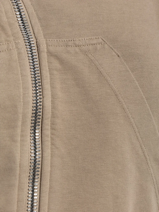 Close up of brown hoodies, showing texture of the cotton fabric