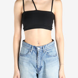 Black tops worn by a person, showing the tops fit