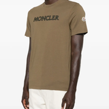 Yellow t-shirt worn by a person, showing the t-shirt fit