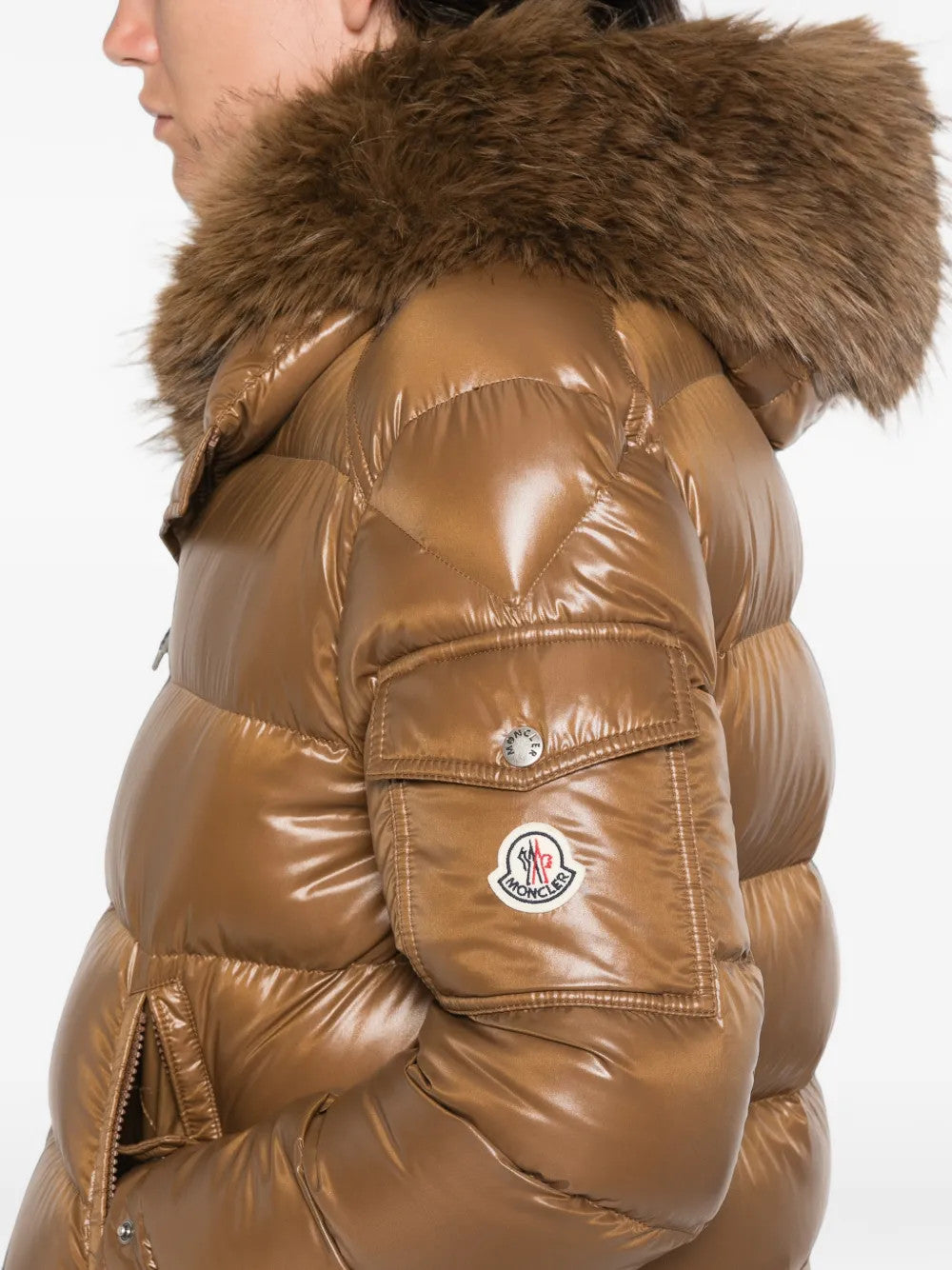 Brown jacket worn by a person, showing the jacket fit