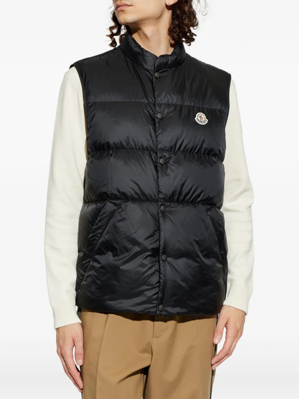 Black jacket worn by a person, showing the jacket fit