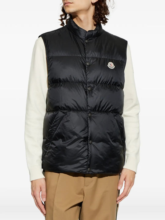 Black jacket worn by a person, showing the jacket fit