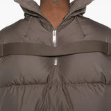 Close up of brown jackets, showing texture of the recycled taffeta fabric