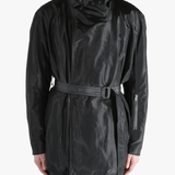 Black jacket worn by a person, showing the jacket's fit