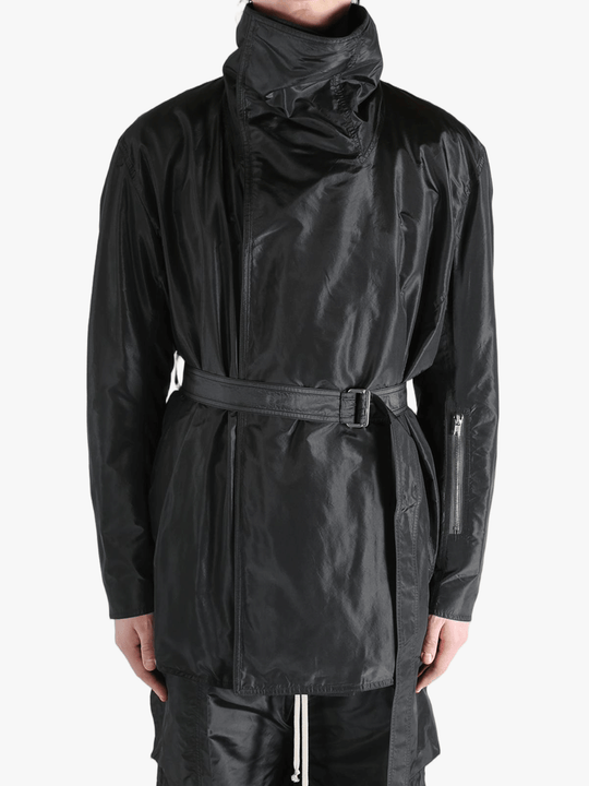 Black jacket worn by a person, showing the jacket's fit