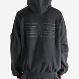 Black hoodie worn by a person, showing the hoodie's fit