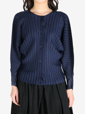 Navy cardigan worn by a person, front view