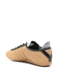 Brown sneakers, back view