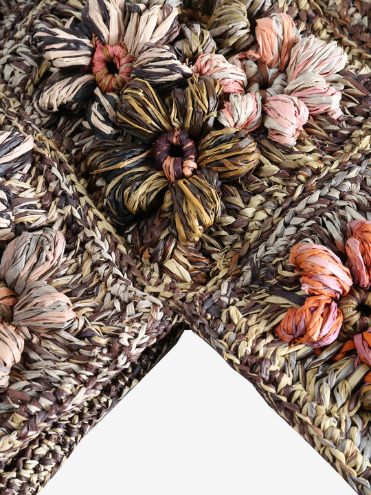 Close up of brown bag,showing texture of the wool fabric.