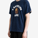Navy t-shirt worn by a person, showing the t-shirt fit