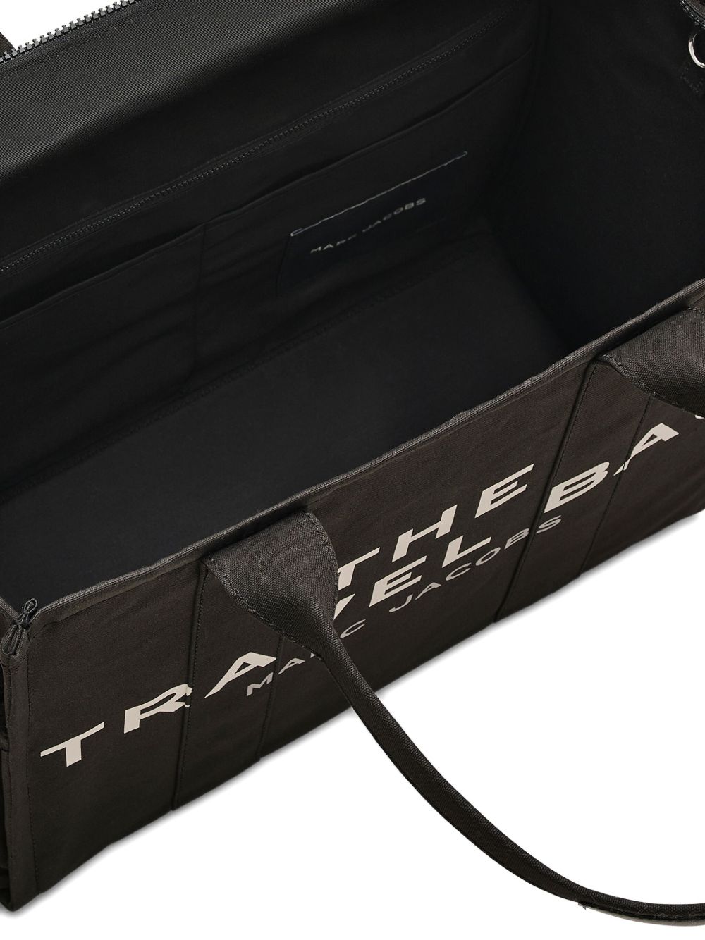 Close up of black bag, showing texture of the cotton fabric