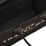Close up of black bag, showing texture of the cotton fabric
