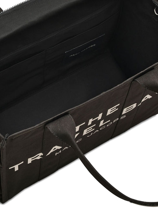 Close up of black bag, showing texture of the cotton fabric
