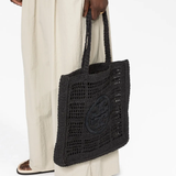 Black bag worn by a person, showing the bag's fit