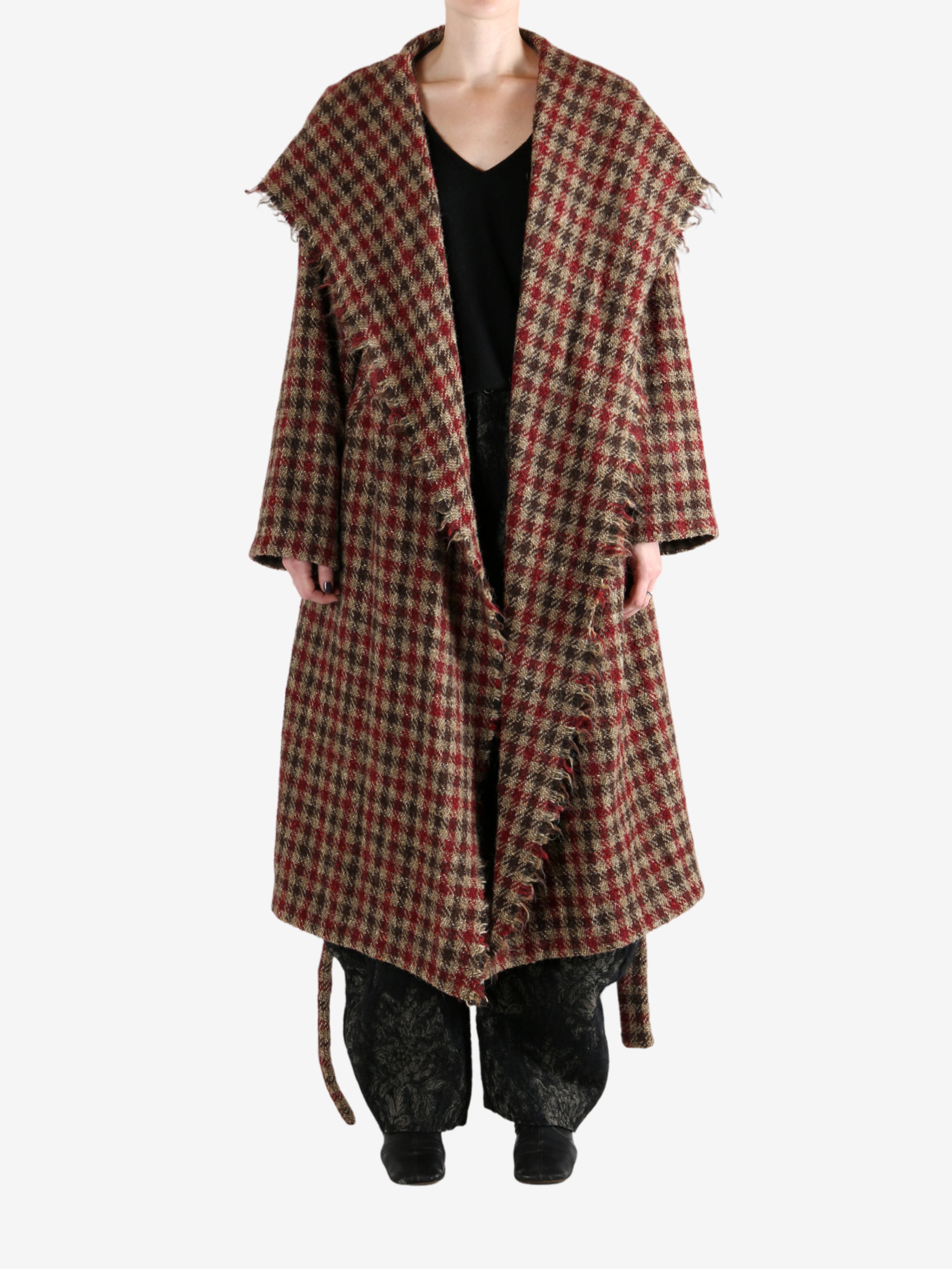 Yellow coat worn by a person, showing the coat's fit