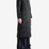 Black jacket worn by a person, showing the jacket's fit