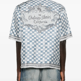 Blue shirt worn by a person, showing the shirt's fit