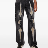 black jeans worn by a person, showing the jeans fit