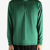 Green pullover worn by a person, showing the pullover's fit
