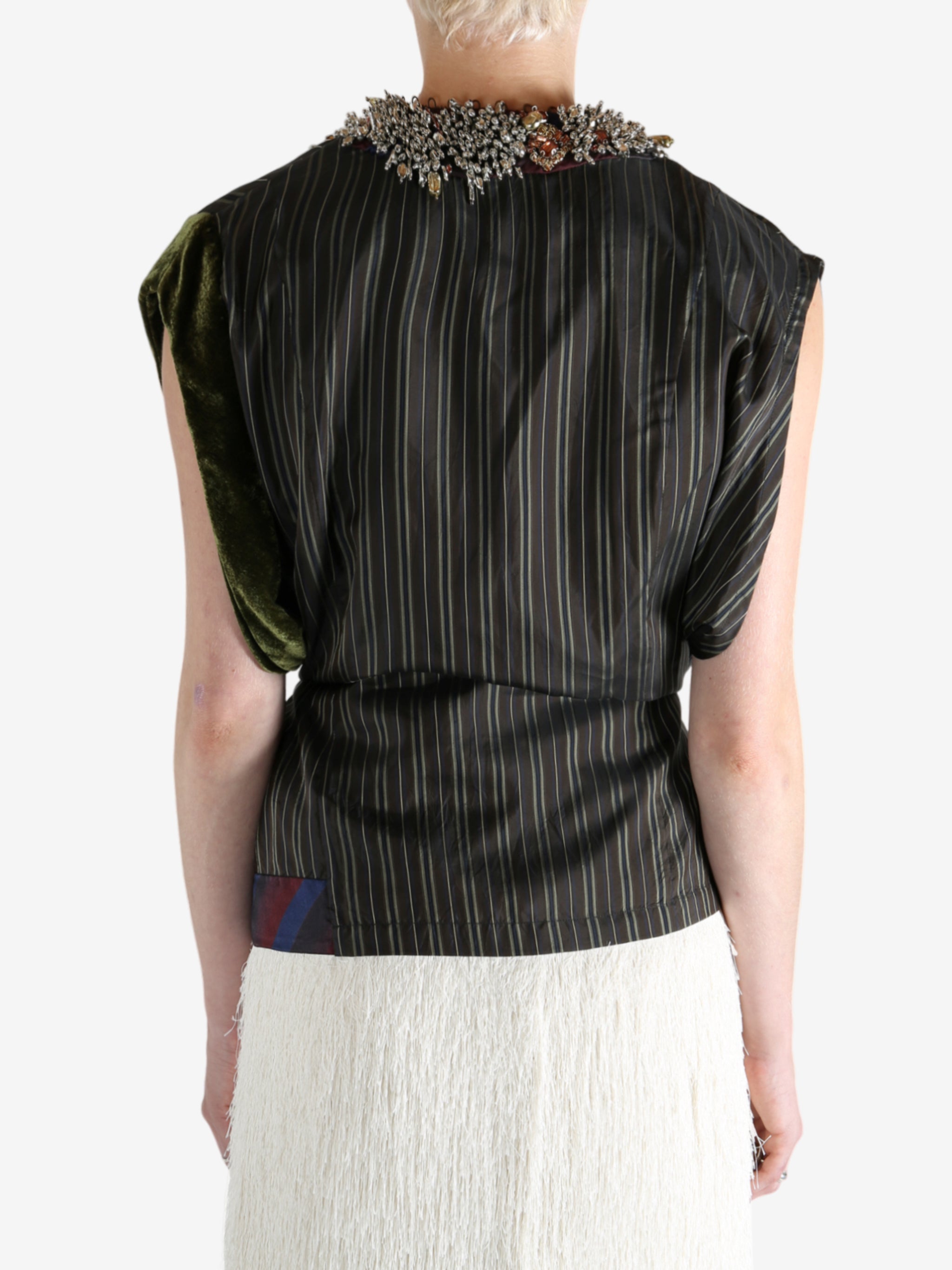 Brown top worn by a person, showing the top fit