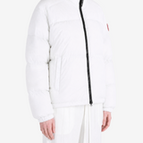 White jacket worn by a person, showing the jacket fit
