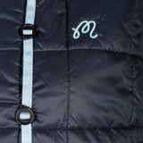 Close up of Navy jacket, showing texture of the 100% recycled polyester made fabric