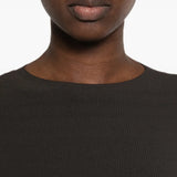 Black t-shirt worn by a person, showing the t-shirt fit