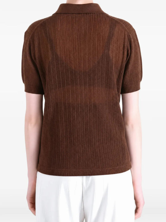 Brown shirt worn by a person, showing the shirt fit