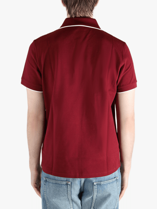 Red shirt worn by a person, showing the fit