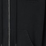 Close up of Black hoodie, showing texture of the 100% cotton fabric