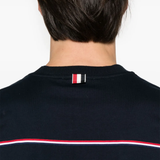 Close up of the blue t-shirt, showing texture of the cotton fabric