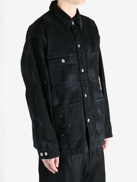 Black jackets worn by a person, showing the jackets fit