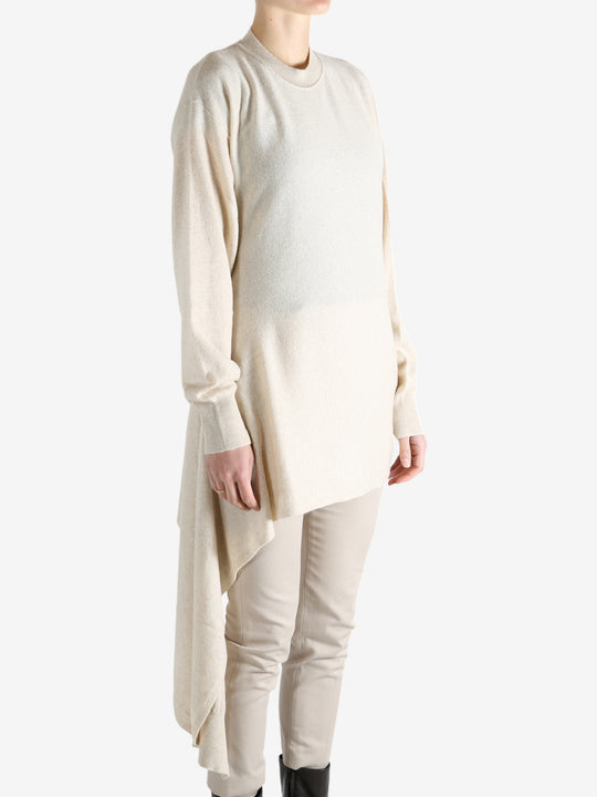 White top worn by a person, showing the top's fit